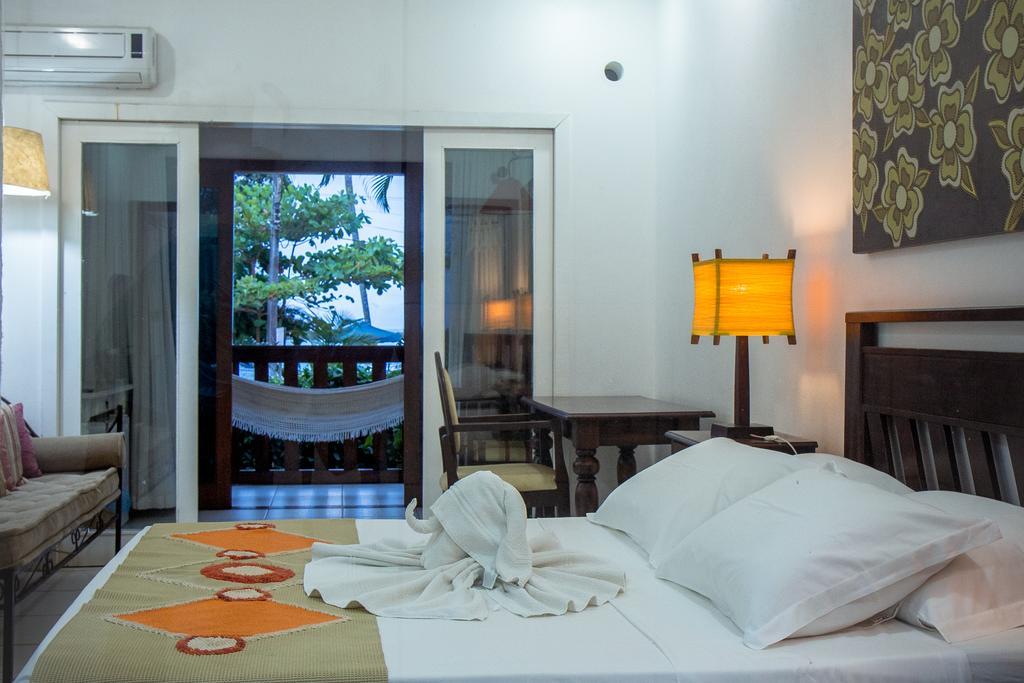 Porto Dos Casais Guest House Итакаре Номер фото